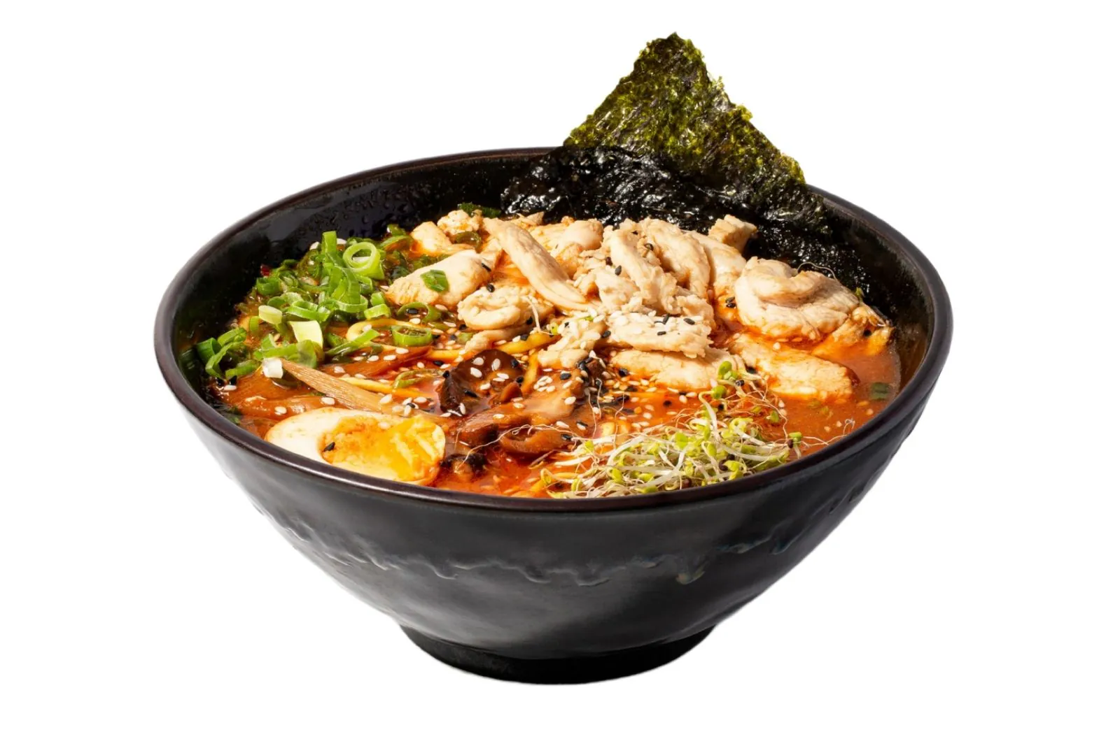 Spicy broth with chicken, mushrooms, ajitsuke tamago and nori at Moto Ramen & Izakaya, a Japanese Restaurant in Vancouver